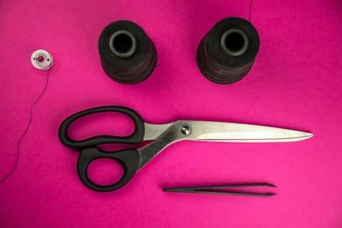 Black tailoring accessories as scissors