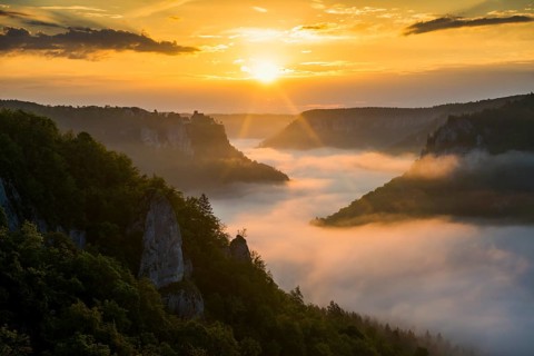View from Eichfelsen to Werenwag Castle with morning fog