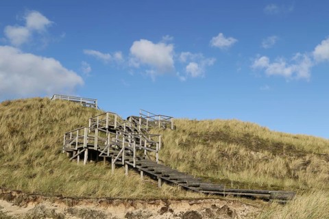 Wooden plank path to the lookout point Aussichtsduene