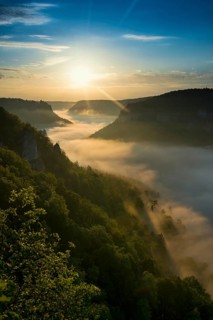 View from Eichfelsen to Werenwag Castle with morning fog