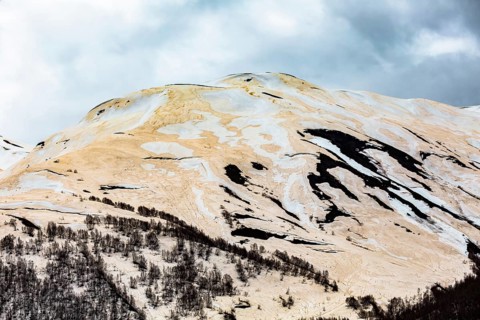Mountain with sandy snow