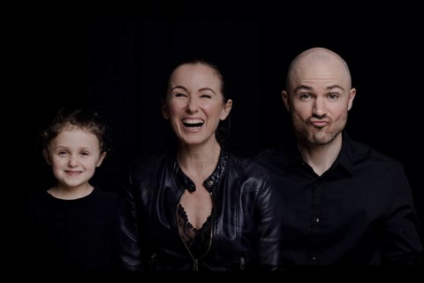Family on black background