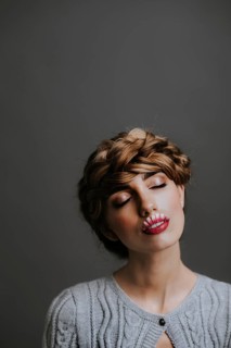 Young woman with flower lips