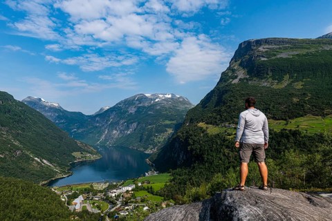 Man overlooking Geirangerfjord