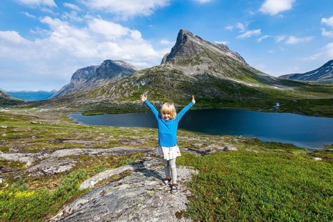 Little girl enjoying the view over a glacial valley