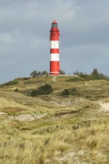 Lighthouse in dune landscape