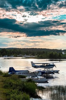 Waterplane at sunset on Lake Inari