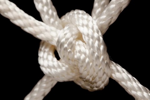 Nylon rope knot on a black background