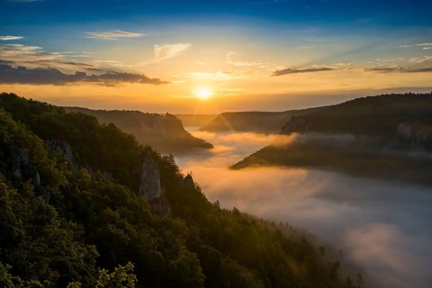 View from Eichfelsen to Werenwag Castle with morning fog