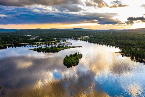 Clouds reflecting at sunset on Lake Inari