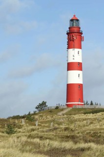 Lighthouse in dune landscape