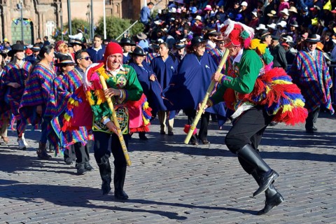 Musician with bamboo flute at the parade on the eve of Inti Raymi