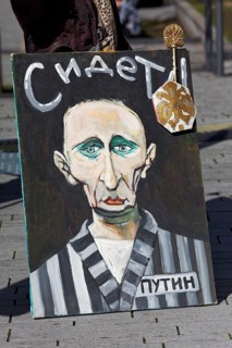 Picture with caricature of Putin in convict clothes