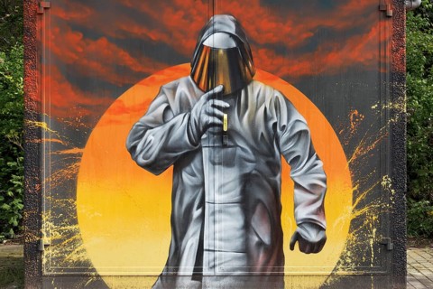 Steelworker in protective suit