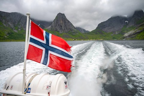 Norwegian flag at the ferry from Reine to Vinstadt on the Reinefjord