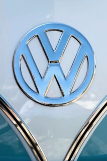 Chrome VW logo on the front of a Volkswagen Type 2 Transporter
