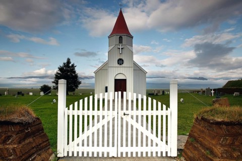 Cemetery gate and church