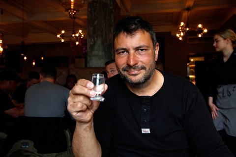 Man in Apotek restaurant drinking Brennivin