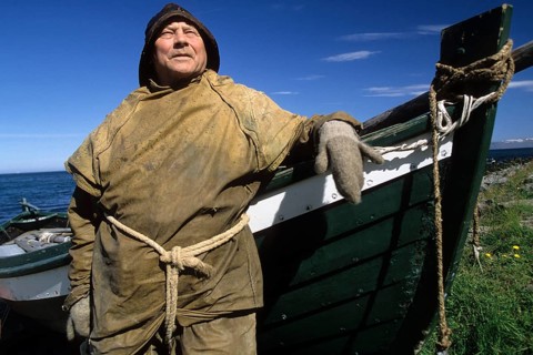 Fisherman with fishing boat