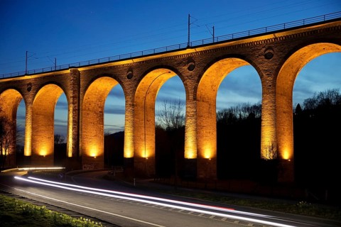 Illuminated viaduct in the evening
