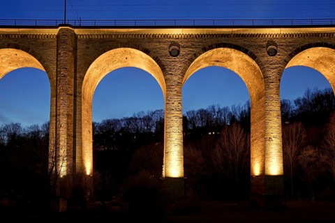 Illuminated viaduct in the evening