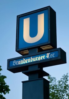 Sign underground station Brandenburg Gate in the evening