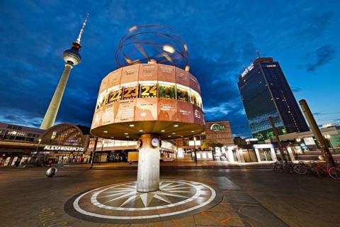 Alexanderplatz with the Berlin TV Tower and the Urania World Clock in the evening