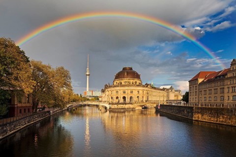 Rainbow over the Bode Museum and the Berlin TV Tower with the Spree River
