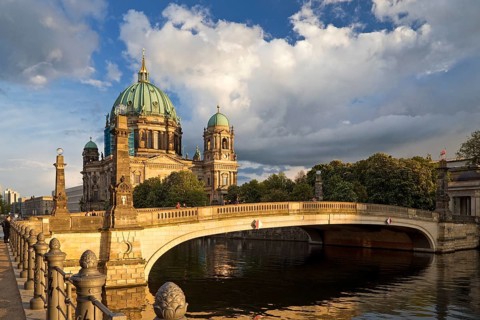 Berlin Cathedral on Museum Island with Friedrichsbruecke over the Spree