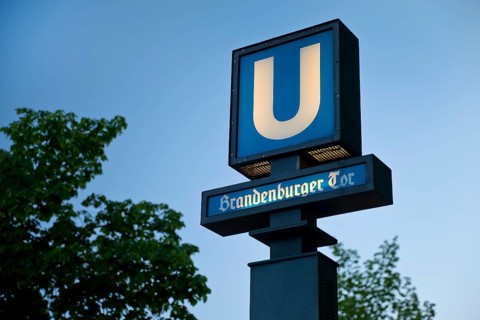 Sign underground station Brandenburg Gate in the evening