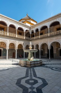 Inner courtyard with archways and fountain