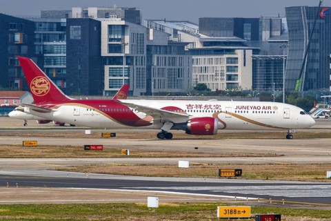A Juneyao Air Boeing 787-9 Dreamliner with registration number B-208A at Shanghai Hongqiao Airport