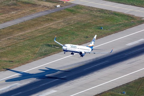 A SunExpress Boeing 737-800 with the registration D-ASXA takes off from Stuttgart Airport