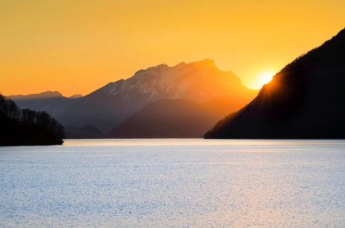 Lake with mountains in the background