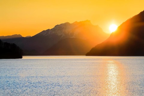Lake with mountains in the background