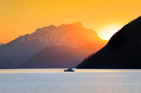 Lake with mountains in the background