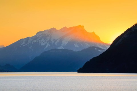 Lake with mountains in the background