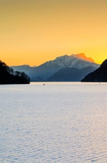 Lake with mountains in the background