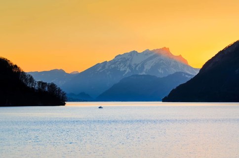 Lake with mountains in the background