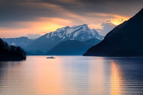 Lake with mountains in the background