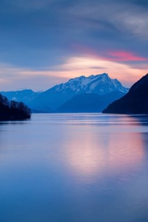 Lake with mountains in the background