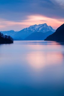 Lake with mountains in the background