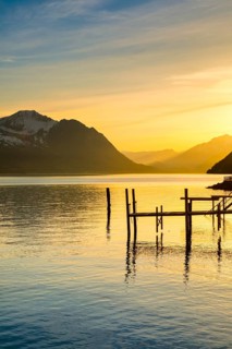 Lake with mountains in the background