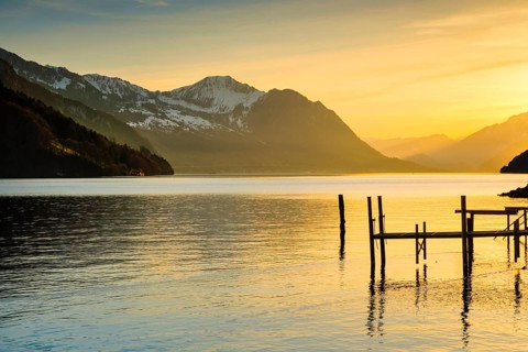 Lake with mountains in the background