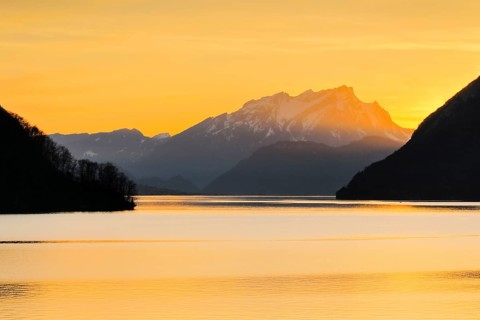 Lake with mountains in the background