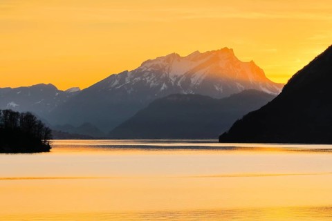 Lake with mountains in the background