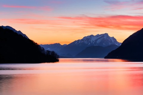 Lake with mountains in the background