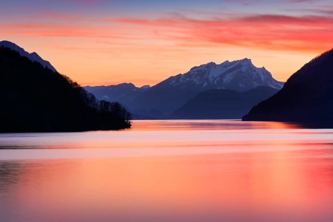Lake with mountains in the background