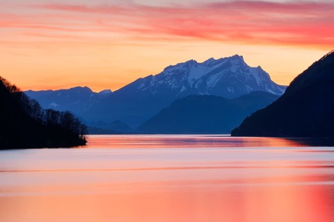 Lake with mountains in the background