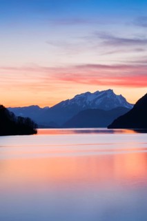 Lake with mountains in the background